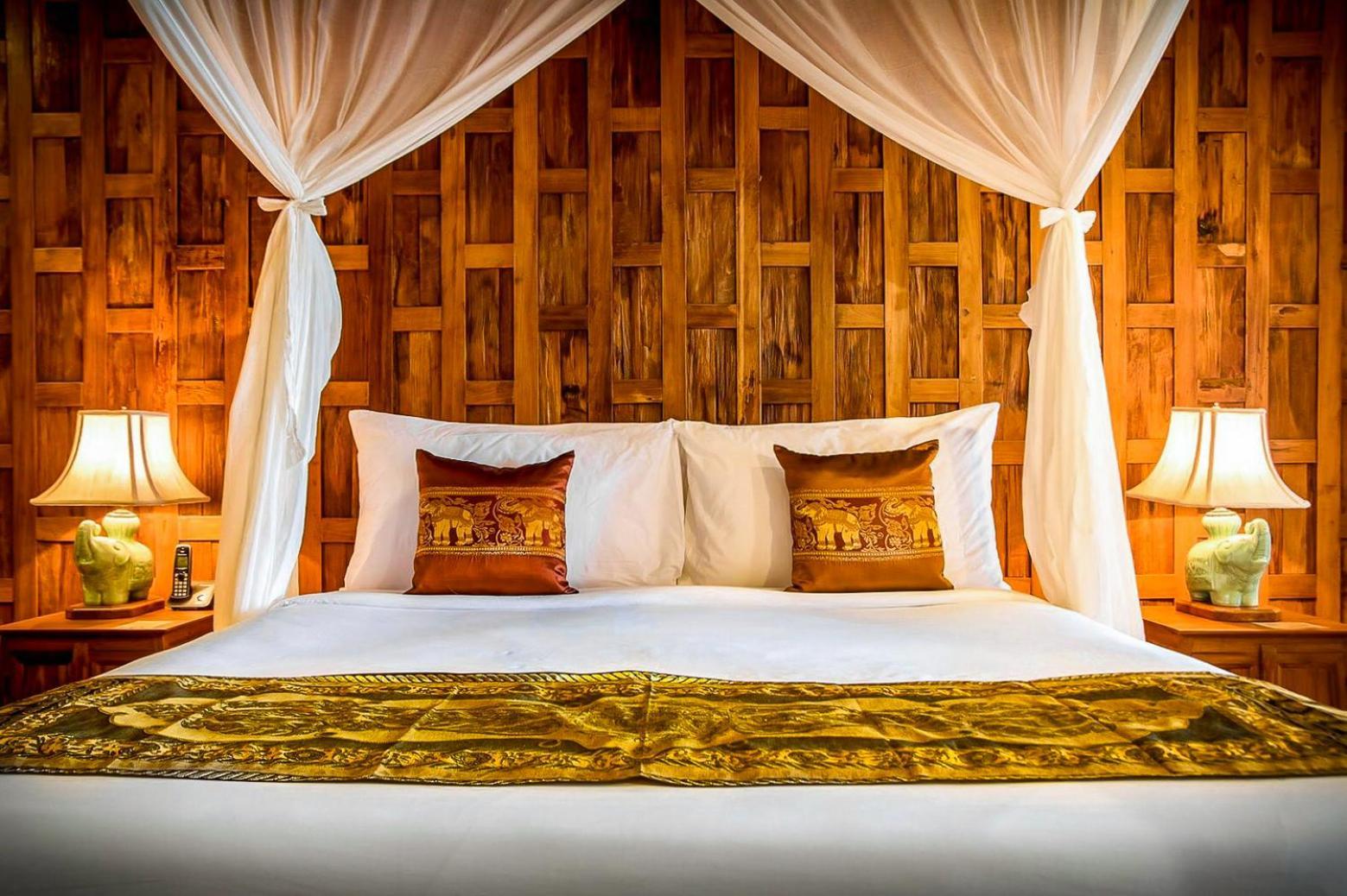 Santhiya Koh Phangan Resort And Spa Zewnętrze zdjęcie A bed with a mosquito net