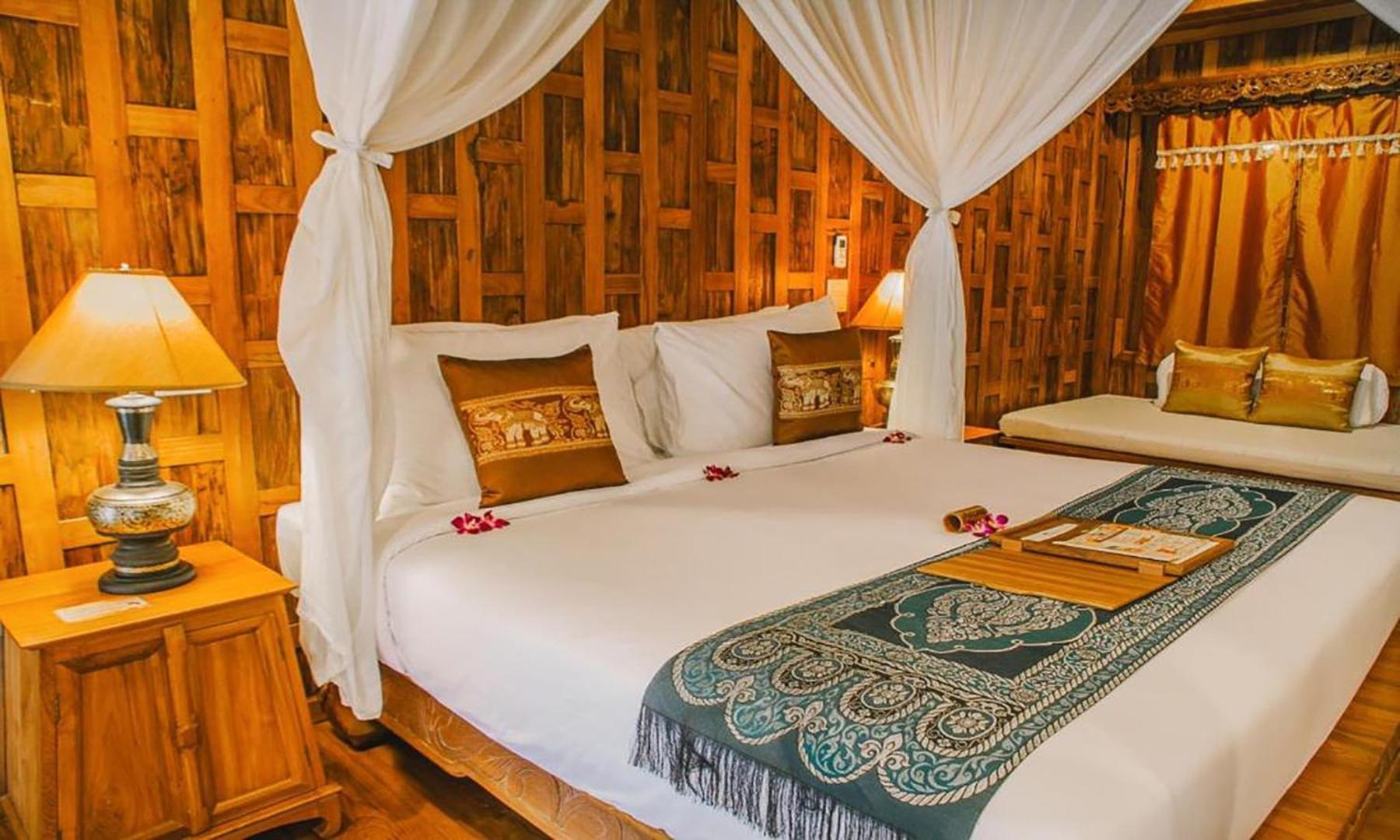 Santhiya Koh Phangan Resort And Spa Zewnętrze zdjęcie A bedroom at the resort